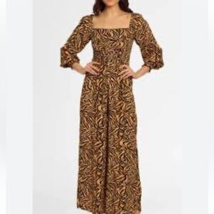 NWT. Retail $170. Size 2. KACHEL.tiger striped long sleeve wide leg jumpsuit.